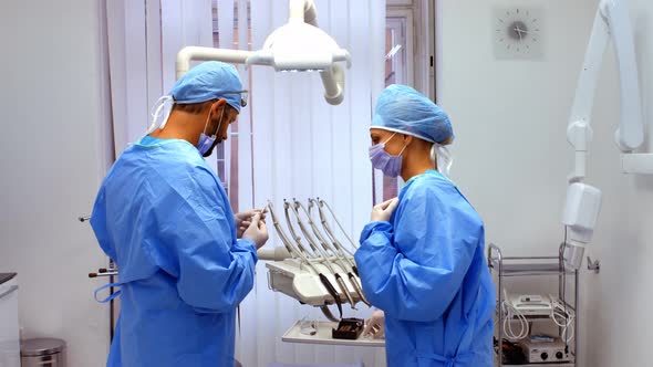 Dentists working in dental clinic