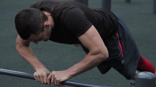 Man training outdoors on sports field