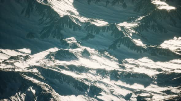 Aerial View of the Alps Mountains in Snow