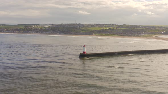 Berwick Breakwater and a Lighthouse in the Summer