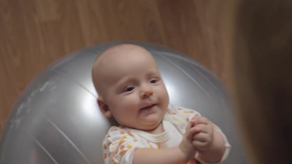 Baby Girl on Gymnastic Ball