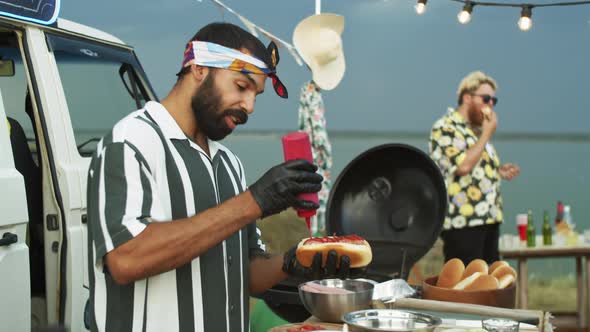 Afro-American Couple Buying Hot Dogs at Food Truck