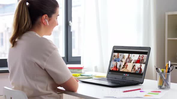 Woman with Laptop Having Video Call on Christmas