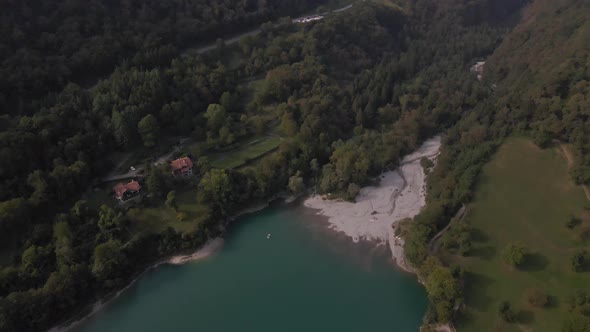 Aerial overview of Tenno Lake, Trentino, Italy. 4k