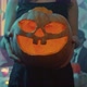 Closeup of an Unrecognizable Girl Holding a Jacko'lantern for Halloween - VideoHive Item for Sale