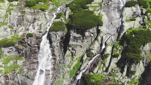 Ice Cold Water dropping from Waterfall in Slovakia