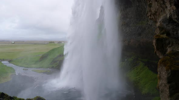 Side view of Seljalandsfoss waterfall in Iceland