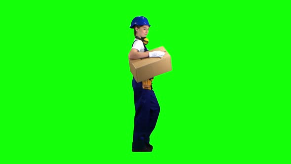 Girl Builder Carries a Cardboard Box, Green Screen