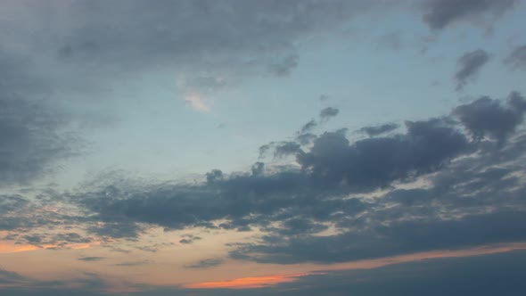 Clouds With Orange Sunrise On A Beautiful Sky In The Morning, Time Lapse