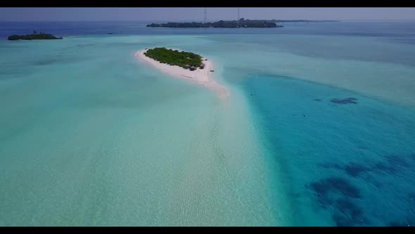 Aerial top down panorama of tropical resort beach trip by turquoise ocean and clean sand background 