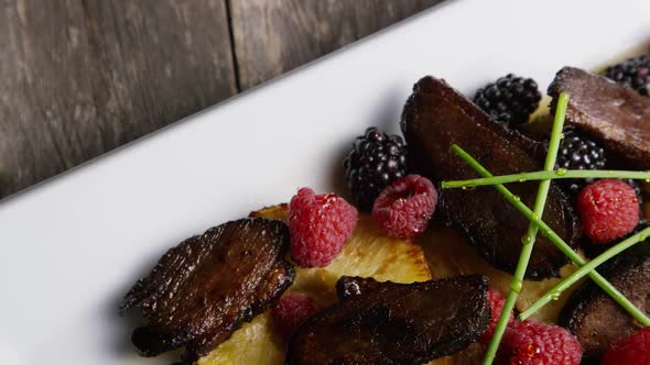 Rotating - smoked duck bacon with grilled pineapple, raspberries, blackberries and honey 