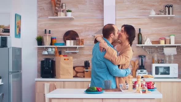 Cheerful Couple Smiling and Dancing