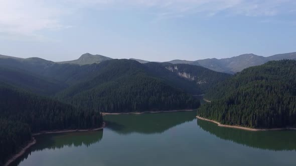 Bolboci Lake In Bucegi Mountains Of Romania, Aerial View