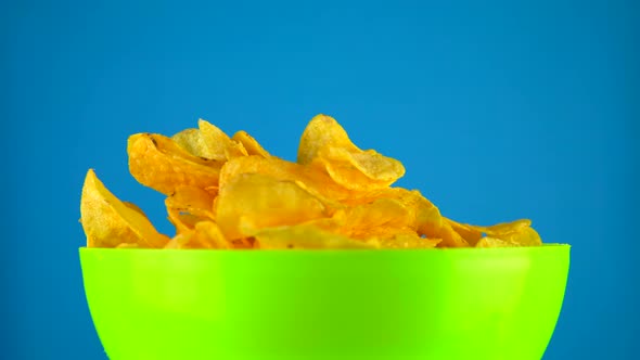 Potato Chips Flying Into Bowl