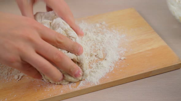 Man Hands Making Pizza Dough on the Kitchen Closeup Selective Focus