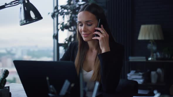 Businesswoman Answering on Phone Call at Office. Lady Talking on Smartphone