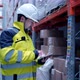 Worker male warehouse worker engineer man in a helmet working on the construction site - VideoHive Item for Sale