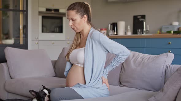 Pregnant woman with hard cramps. Shot with RED helium camera in 8K