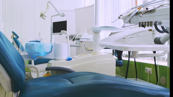 Closeup of Dental Clinic Equipment in Soothing Green Colors