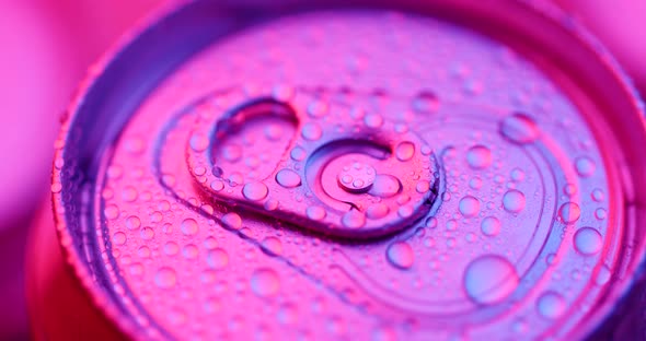 Beer can with purple and pink light