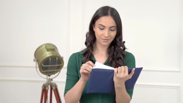 Indian woman reading a book