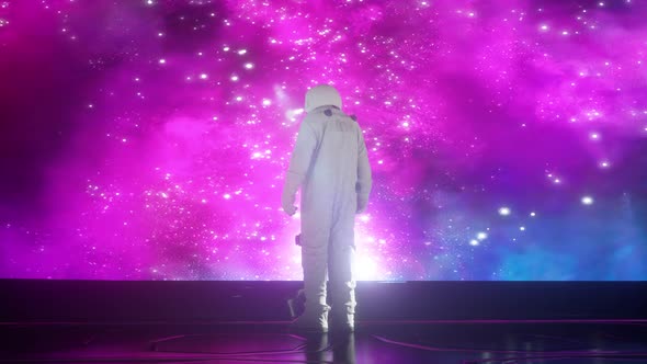 Alone astronaut in futuristic space corridor, room. view of the earth