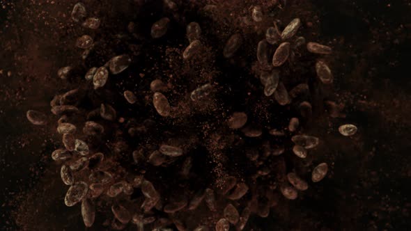 Super Slow Motion Shot of Exploding Raw Chocolate Beans and Cocoa Powder at 1000Fps.