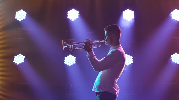 Trumpet Player Performance on Stage. Trumpet in Hands Close Up. Side View. Slow Motion.