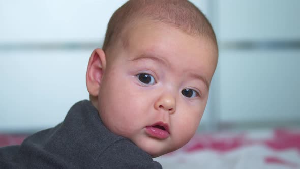 The Look of the Baby in the Camera Close Up Shot