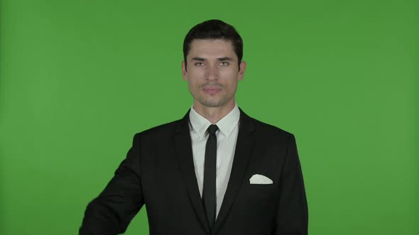 Young Businessman Showing Thumbs Down Chroma Key