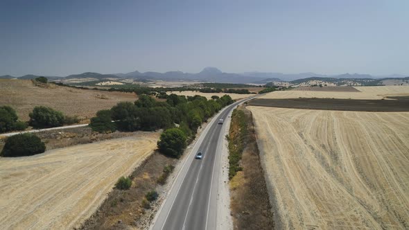 Aerial Of Cargo Truck Driving On Road