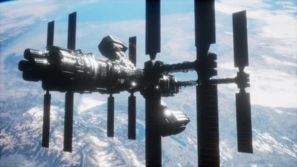 A View of the Earth and a Spaceship. ISS Is Orbiting the Earth alt