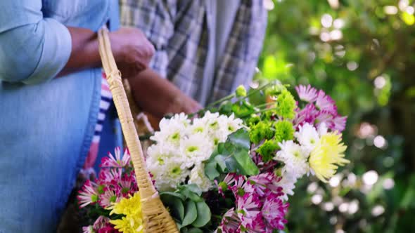 Senior couple walking in garden