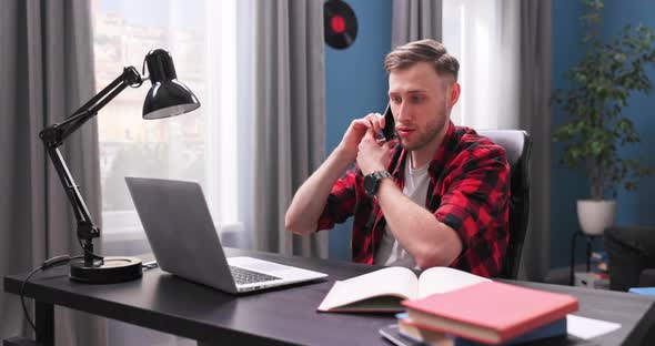 A Young Boy Works Remotely