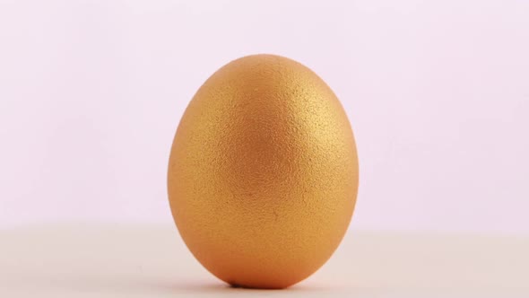Golden Easter Egg Isolated Over White Background