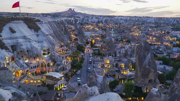 Day to night zoom out timelapse of a cityscape in Goreme, Cappadocia, Turkey