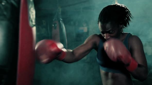 Female Boxer training in Boxing Club