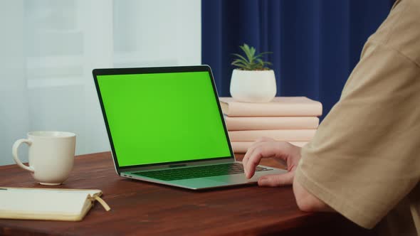 Man Student Using Laptop with Chroma Key Closeup
