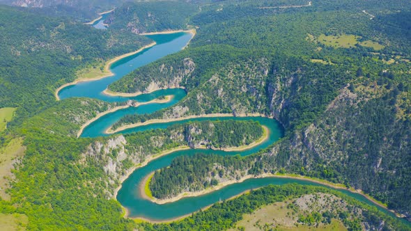 Aerial Drone View River in a Mountain Valley Landscape