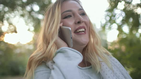 Woman Plus Size Say Goodbye On Mobile Outside