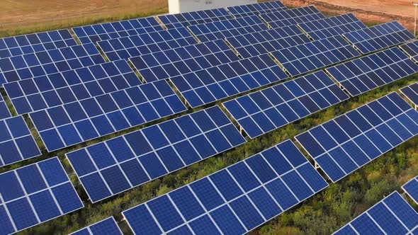 Aerial view of sunset on solar panel's field- Italy