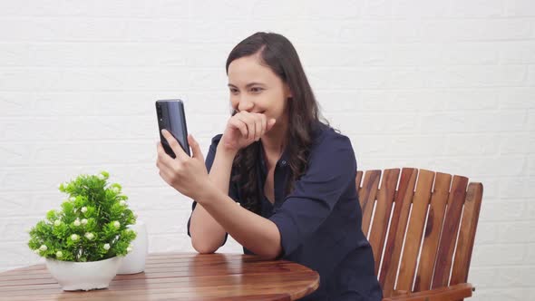 Happy Indian girl on video call