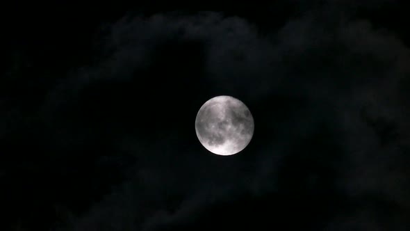 Full Moon on a Cloudy Night 4k video footage, Full Moon on a Dark Night and Clouds in Fast Motion,