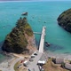 4K Drone flies above Trinidad Harbor and Pier with Ships Parked along coastline - VideoHive Item for Sale