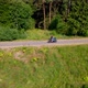 A Young Man Rides a Motorcycle Outside the City - VideoHive Item for Sale