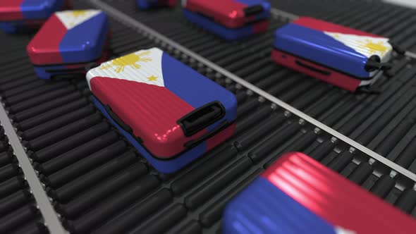 Travel Suitcases with Flag of the Philippines on Conveyer