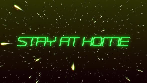 Animation of words Stay At Home written in green neon letters over shiny points floating
