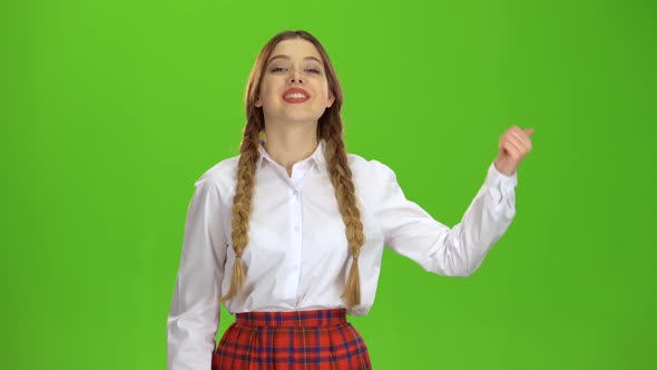 Teenager Shows a Thumbs Up . Green Screen