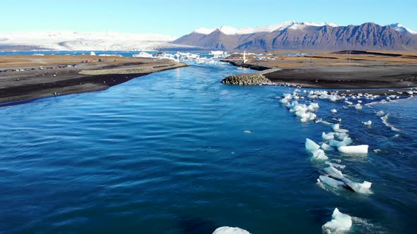 Snowy rocks in sea water