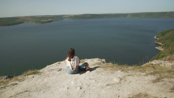 Young Woman Looking at Amazing Landscape of Bakota Bay